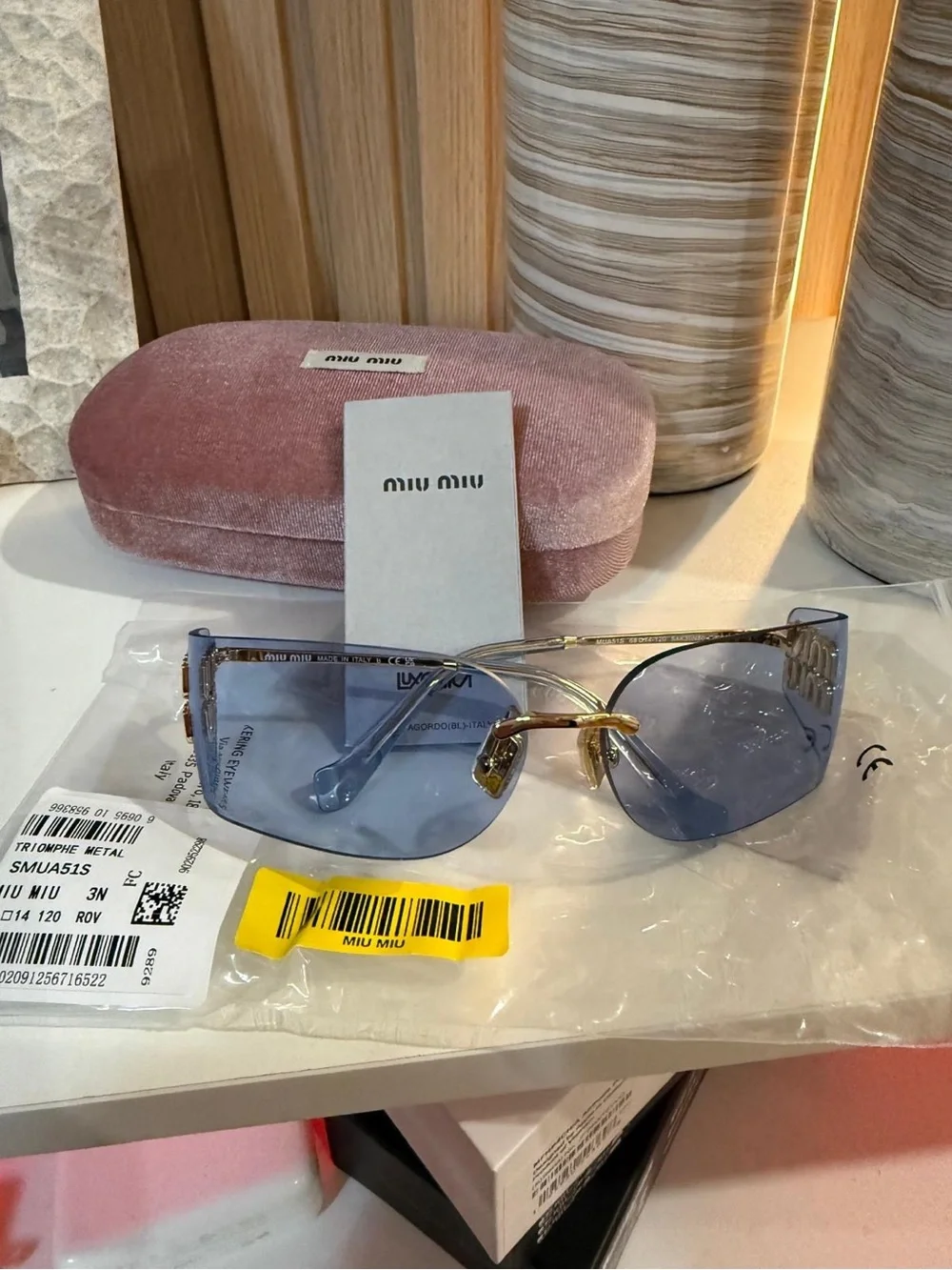 Miu Miu Women's Blue Rimless Sunglasses